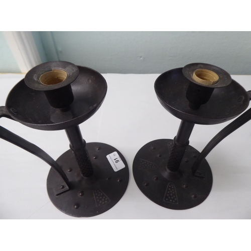 91 - A pair of Arts & Crafts inspired, cast iron candlesticks  stamped Gorers  7