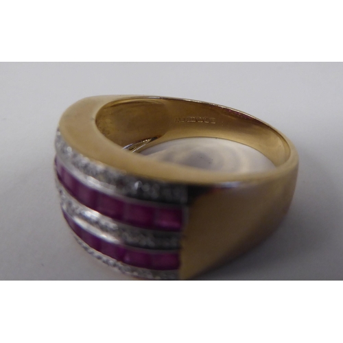 93 - A 9ct gold ring, set with rows of rubies and diamonds