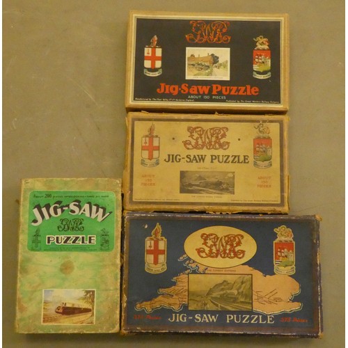 192 - Four vintage jigsaw puzzles: to include 'The Cornish Riviera Express'  boxed  (completeness not guar... 