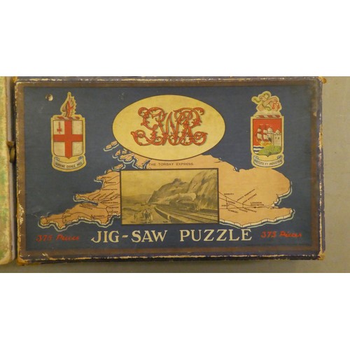 192 - Four vintage jigsaw puzzles: to include 'The Cornish Riviera Express'  boxed  (completeness not guar... 