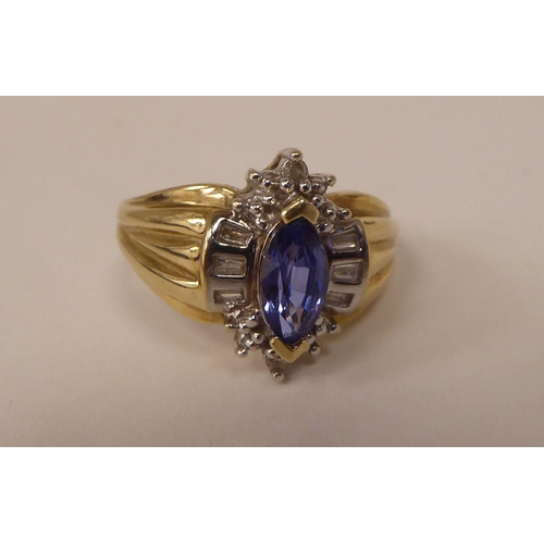 96 - A 10ct gold vintage design ring, set with a blue stone