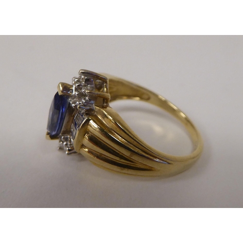 96 - A 10ct gold vintage design ring, set with a blue stone