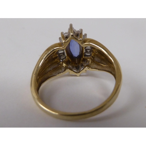 96 - A 10ct gold vintage design ring, set with a blue stone