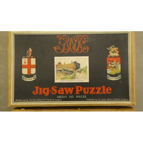 192 - Four vintage jigsaw puzzles: to include 'The Cornish Riviera Express'  boxed  (completeness not guar... 