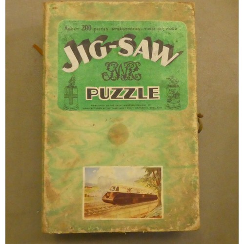 192 - Four vintage jigsaw puzzles: to include 'The Cornish Riviera Express'  boxed  (completeness not guar... 