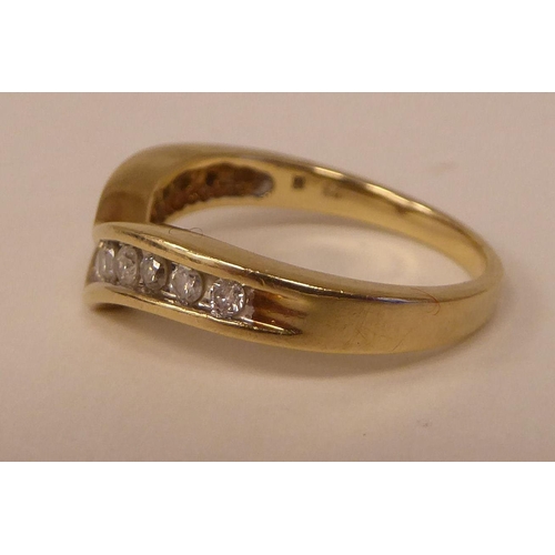 98 - A 9ct gold diamond set wishbone design ring