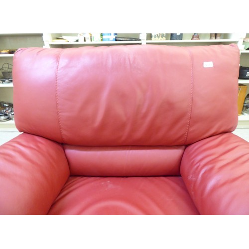 224 - A modern red faux hide upholstered armchair