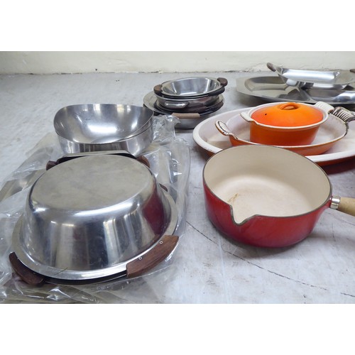 72 - Mainly 1970s domestic metalware: to include a stainless steel table and serving wares