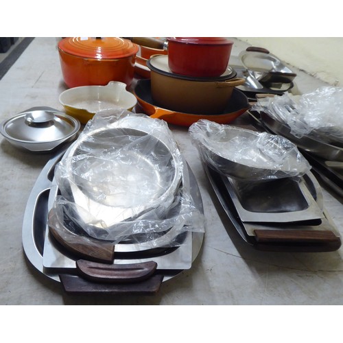 72 - Mainly 1970s domestic metalware: to include a stainless steel table and serving wares