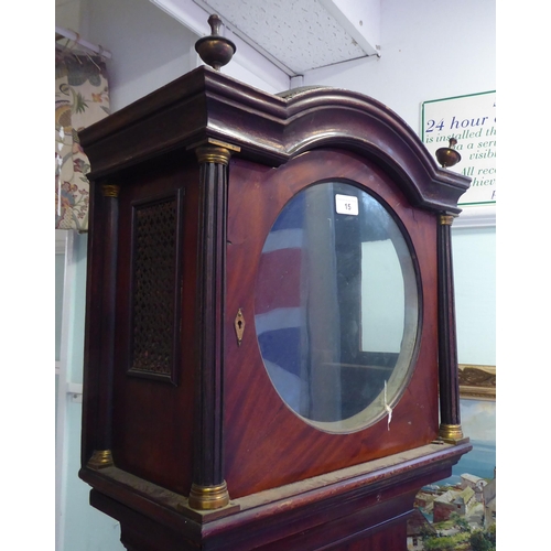 15 - A 19thC mahogany longcase clock case, decorated with a pair of finials  79