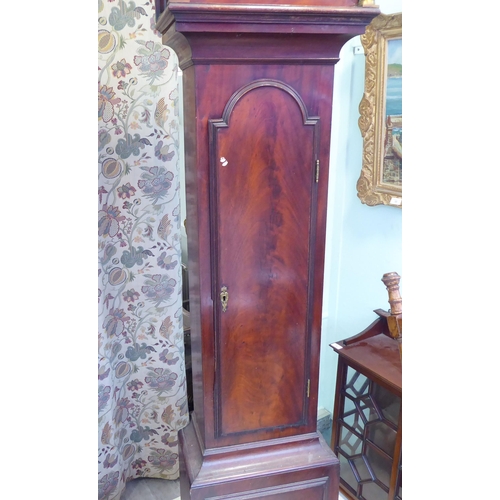 15 - A 19thC mahogany longcase clock case, decorated with a pair of finials  79