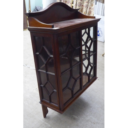 20 - An Edwardian mahogany, partially glazed hanging display cabinet  33