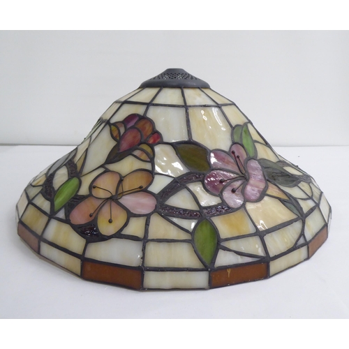 27 - Four dissimilar Tiffany inspired, coloured panel, lead glazed centre light shades  largest 18