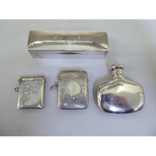 317 - Silver collectables: to include two dissimilar pendant vesta cases; a rectangular, hinged pin box&nb... 