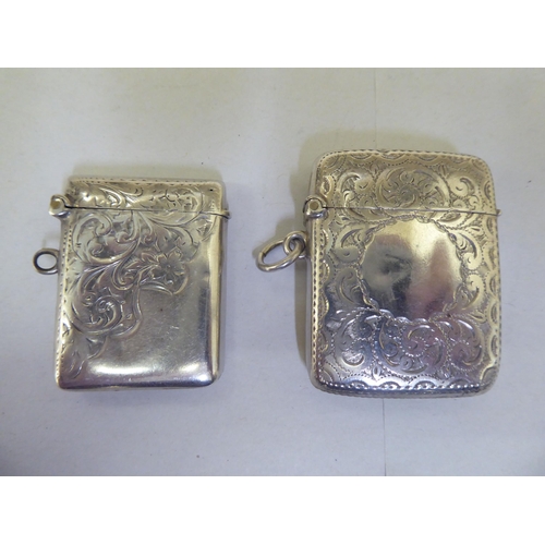 317 - Silver collectables: to include two dissimilar pendant vesta cases; a rectangular, hinged pin box&nb... 