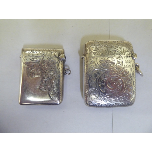 317 - Silver collectables: to include two dissimilar pendant vesta cases; a rectangular, hinged pin box&nb... 