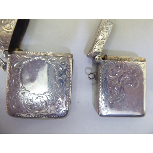 317 - Silver collectables: to include two dissimilar pendant vesta cases; a rectangular, hinged pin box&nb... 