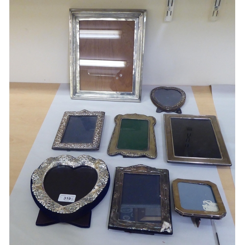 319 - Eight silver, EPNS and other photograph frames  various sizes and forms  mixed marks 