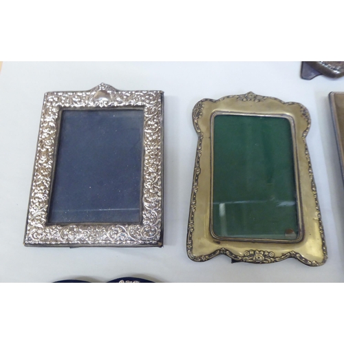 319 - Eight silver, EPNS and other photograph frames  various sizes and forms  mixed marks 