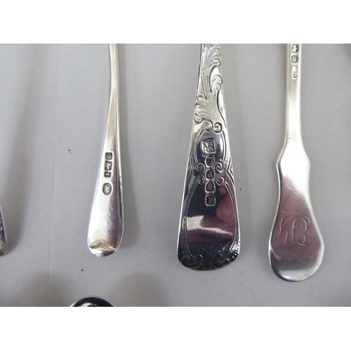 324 - Silver flatware: to include a set of six bright cut engraved teaspoons; and four seal end terminal c... 