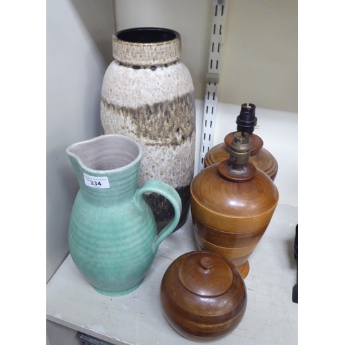 334 - A mixed lot: to include two similar mixed hardwood table lamps  approx. 9