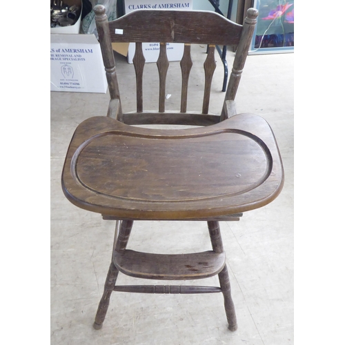 48 - Small furniture: to include a 1950s stained beech framed fireside chair