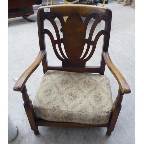 48 - Small furniture: to include a 1950s stained beech framed fireside chair