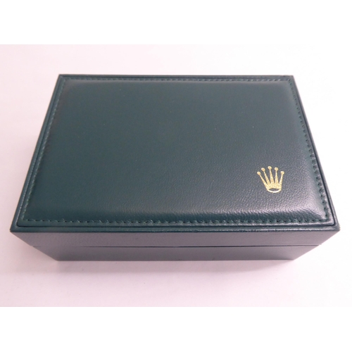 52 - A hinged Rolex watch box