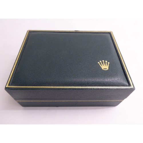 53 - A hinged Rolex watch box