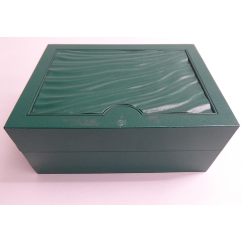 54 - A hinged Rolex watch box