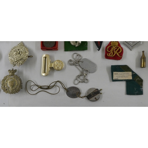 68 - Military badges, some copies: to include a cast metal skull and cross bones(Please Note: this lot is... 