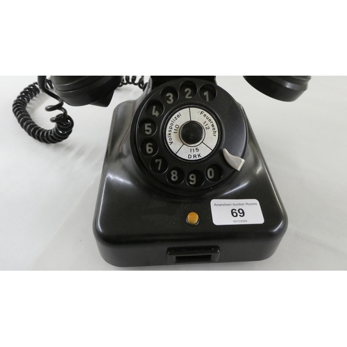 69 - A German VEB RFT 305 black Bakelite cased telephone(Please Note: this lot is subject to the statemen... 