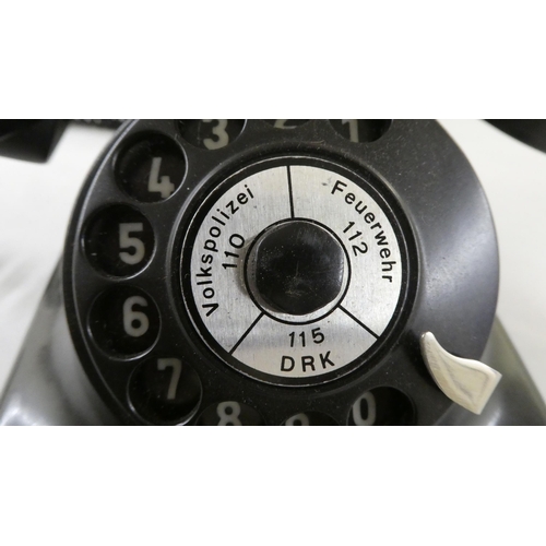 69 - A German VEB RFT 305 black Bakelite cased telephone(Please Note: this lot is subject to the statemen... 