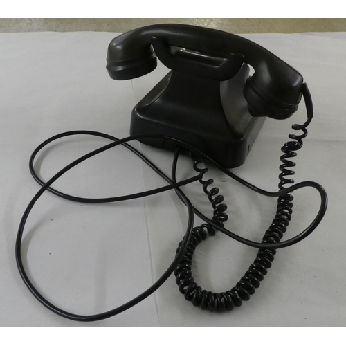 69 - A German VEB RFT 305 black Bakelite cased telephone(Please Note: this lot is subject to the statemen... 