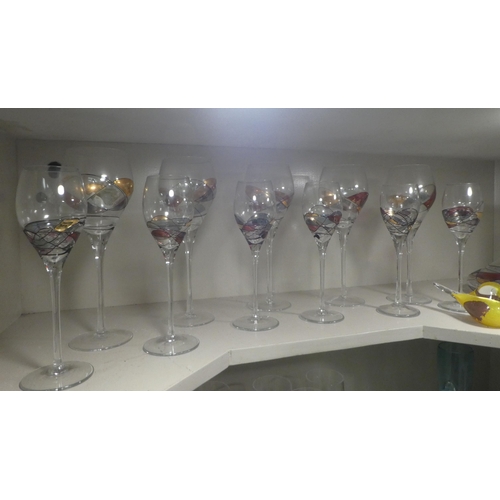 13 - Glassware: to include pedestal wines; Champagne flutes, and other tableware