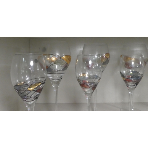 13 - Glassware: to include pedestal wines; Champagne flutes, and other tableware