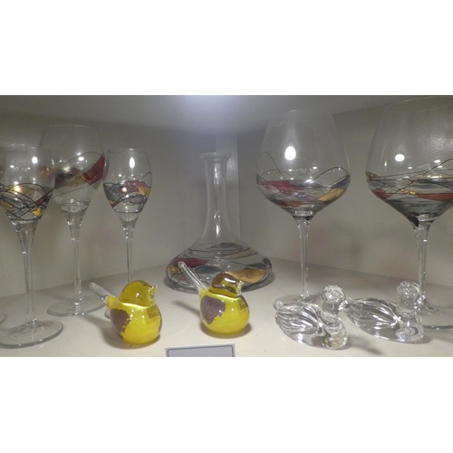 13 - Glassware: to include pedestal wines; Champagne flutes, and other tableware