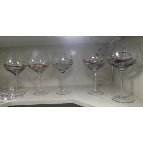 13 - Glassware: to include pedestal wines; Champagne flutes, and other tableware