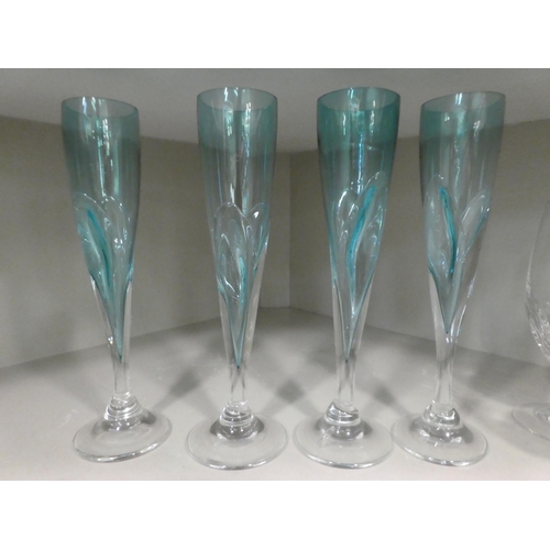 13 - Glassware: to include pedestal wines; Champagne flutes, and other tableware