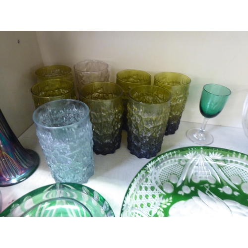 11 - Glassware: to include a set of six 1960s/1970s knobbly green tinted tumblers 