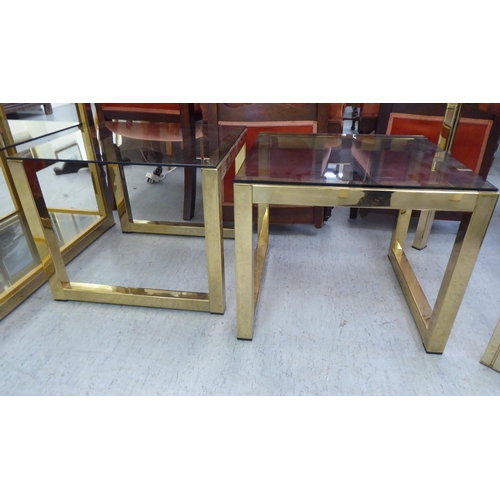 120 - Lacquered brass framed furniture: to include a three tier bookcase  35