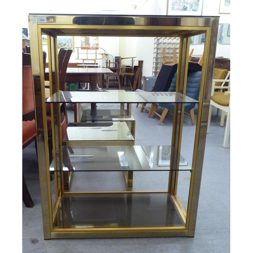 120 - Lacquered brass framed furniture: to include a three tier bookcase  35