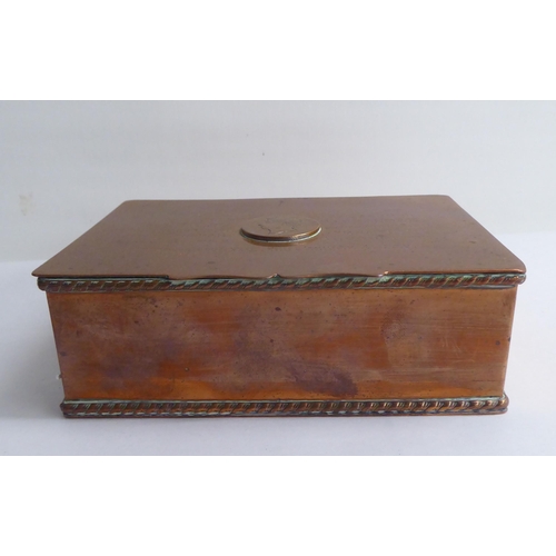 125 - A copper cigarette box with straight sides and a hinged lid, bearing a presentation inscription to L... 