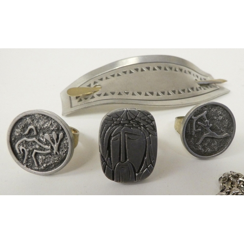 130 - Jorgen Jensen pewter items of personal ornament: to include hair barrettes and a bangle