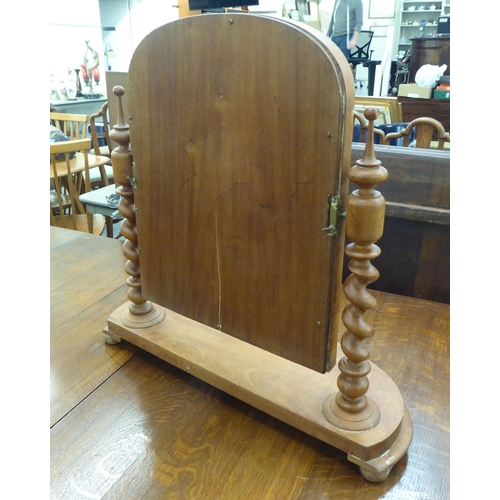 143 - A late Victorian mahogany dressing table mirror, the plate pivoting on barleytwist uprights, on a pl... 