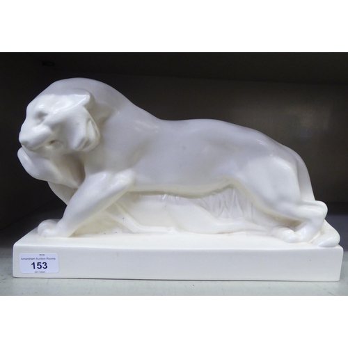 153 - A Wedgwood cream coloured glazed china model, a lioness with captured prey  bears printed & impr... 