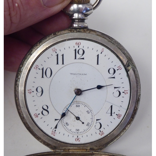 154 - A Waltham silver cased pocket watch, faced by an Arabic dial, incorporating a subsidiary; and a silv... 