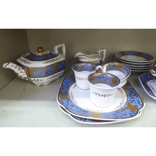 166 - A part set of Spode Felspar porcelain teaware: to include a teapot, sucrier and milk jug