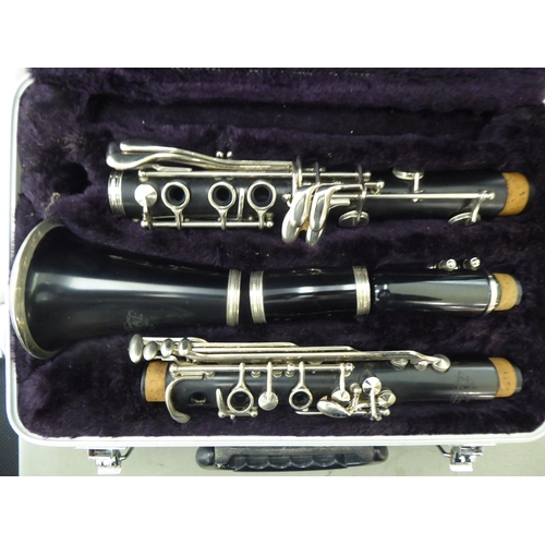 176 - A La Fleur & Son clarinet, in a compartmented wooden case; and a similar, J Michael Japanese exa... 