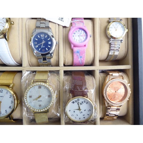 195 - Fourteen variously cased and strapped wristwatches; and some spare straps, in a watch box